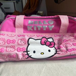 small hello kitty weekender duffel bag on wheels!!